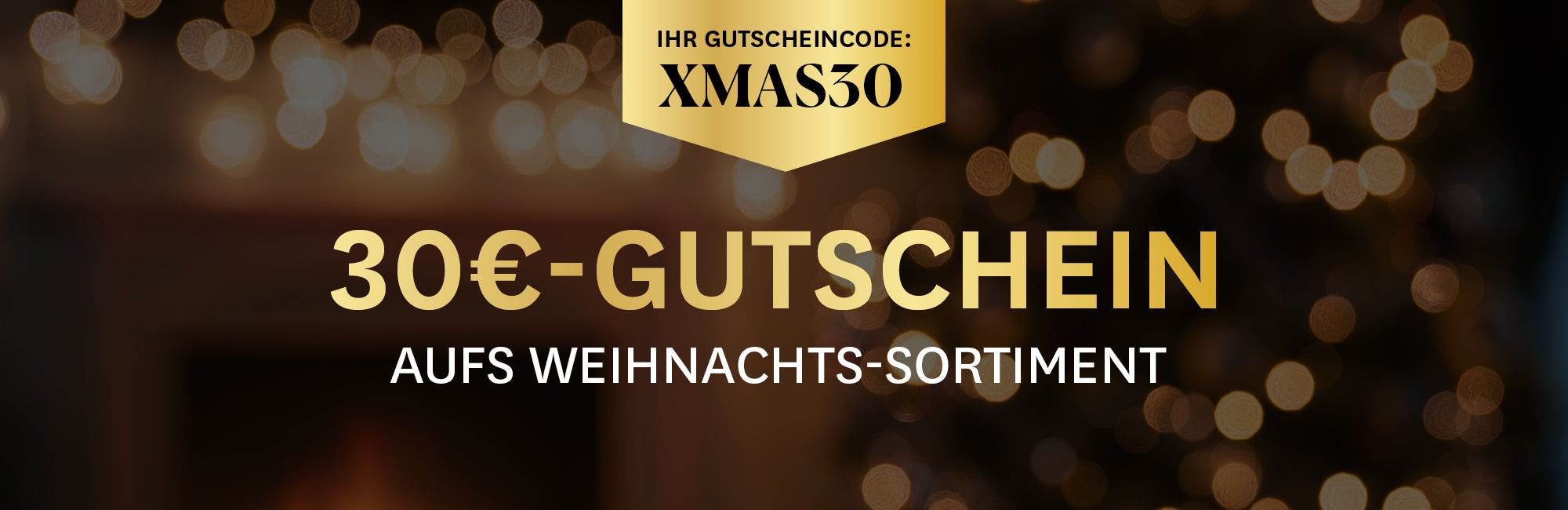 Weihnachtsangebot für Wein mit Rabatt, umgeben von unscharfen Lichtern. Text: "Weine zum Fest, sparen Sie bis zu 42%".